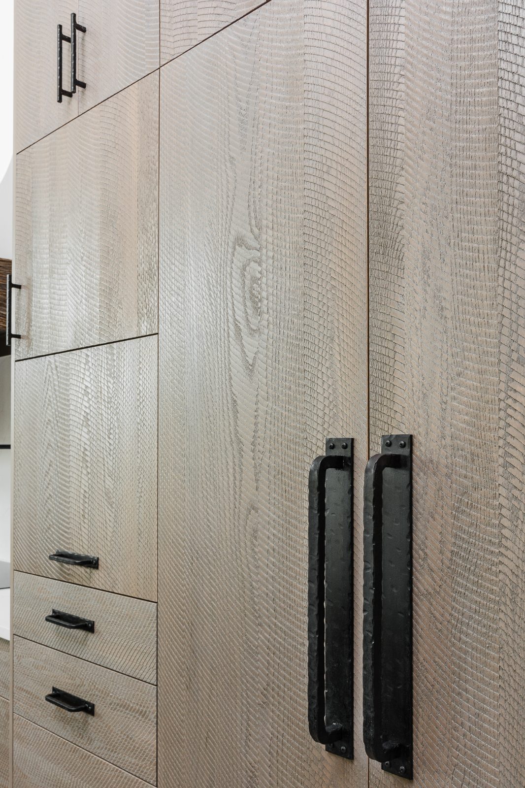 Floor-to-ceiling built-in storage cabinetry in cerused oak, Delray Beach FL